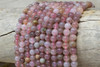 Madagascar Rose Quartz Polished 6mm Round - Multi Color