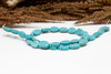 Magnesite Polished Turquoise 9x13mm Leaf
