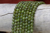 Peridot Polished 6mm Round - Medium