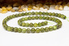 Peridot Polished 6mm Round - Medium