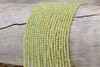 Zircon CZ AA Grade Polished Light Olive 2mm Faceted Round