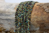 African Turquoise Polished 2mm Faceted Round