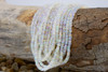 Ethiopian Opal Polished 3-3.7mm Smooth White Graduated Rondelle