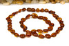 Baltic Amber Honey Cognac Polished 8-11mm Oval - 17" Strand