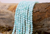 Natural Shell Polished 4x6mm Dyed Aqua Rondelle