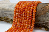 Jade Polished 5x8mm Smooth Rondelle - Dyed Orange Mix