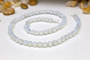 Opalite Polished 6mm Faceted Round