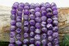 Dog Tooth Amethyst A Grade Polished 10mm Round