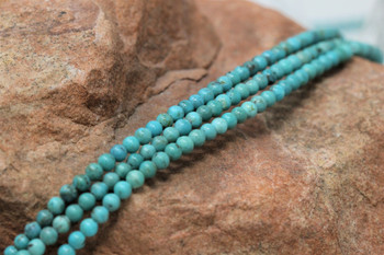 Kingman Turquoise Polished 2.5-3mm Round