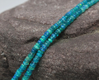Ethiopian Opal Polished Teal 3-5mm Rondelle - Graduated