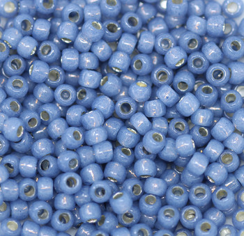 Size 6 Toho Seed Beads -- 588A Montana Opal / Gilt Lined