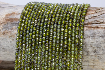 Zircon AA Grade Polished Olive 4mm Faceted Round