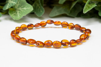 Baltic Amber Honey Cognac Polished 6-7mm Oval Nugget - 7" Strand