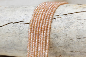 Zircon CZ AA Grade Polished Light Peach 2x3mm Faceted Rondelle