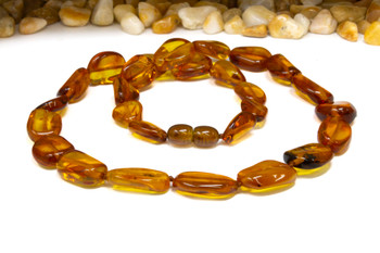 Baltic Amber Honey Cognac Polished 9-18mm Oval Nugget - 18.5" Strand