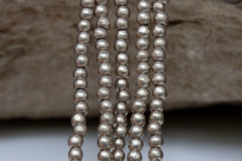 Czech Glass 2mm Round -- Saturated Metallic Hazelnut