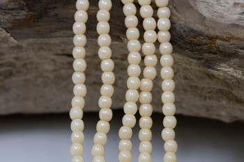 Czech Glass 2mm Round -- Luster Opaque Champagne