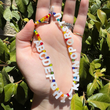Mother of Pearl Polished 7x10mm Letter E