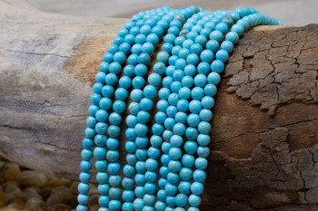 Magnesite Polished 4mm Turquoise Round