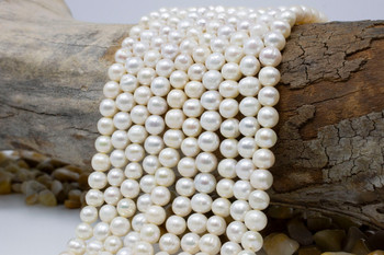 Freshwater Pearls B Grade Polished White 9.5x11mm Graduated Round