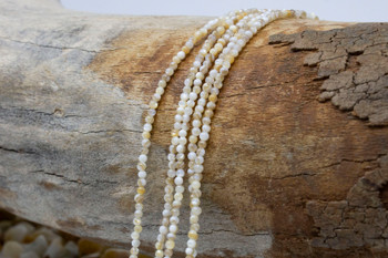 Natural Shell 2mm Polished Round
