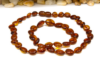 Baltic Amber Honey Cognac Polished 8-11mm Oval - 17" Strand