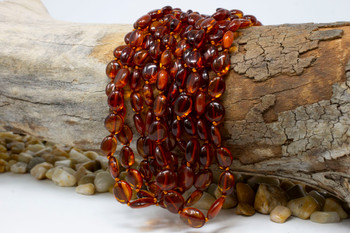 Baltic Amber Honey Cognac Polished 8-11mm Oval - 17" Strand