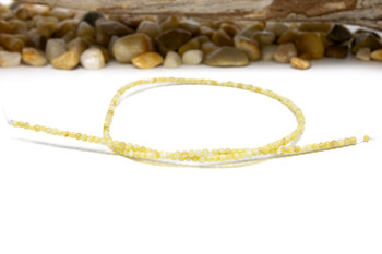 Natural Shell Buttercup 2.5mm Polished Round