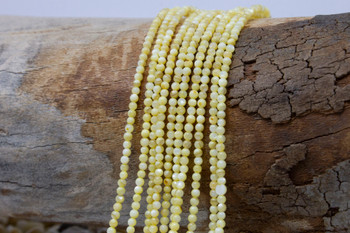Natural Shell Buttercup 2.5mm Polished Round