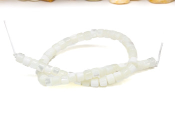 Natural Shell 3x4mm Polished Wheel - 7" Strand