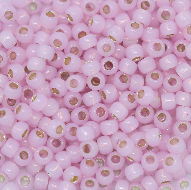 Size 6 Toho Seed Beads -- 555A Pink Opal / Gilt Lined