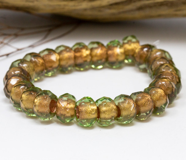 Czech Glass 6x9mm Roller Rondelle Beads - Transparent Light Green Copper Lined