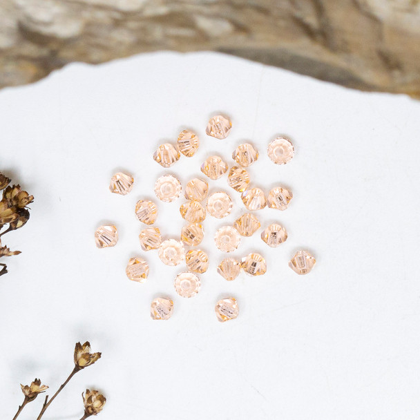 Swarovski Crystal Light Peach 5328 3mm Bicones
