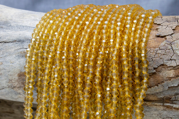 Glass Crystal Polished 4mm Faceted Round - Light Yellow Topaz