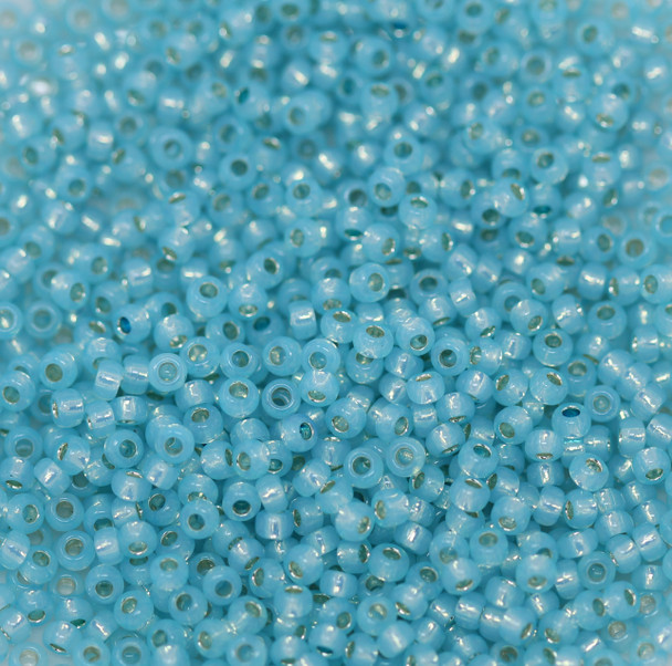 Size 11 Toho Seed Beads -- 587A Seafoam Opal / Gilt Lined