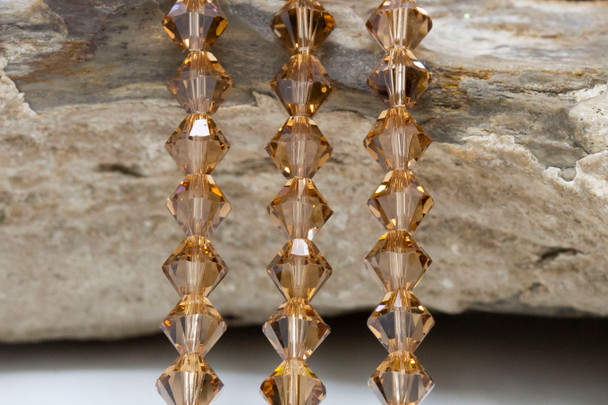 Swarovski Crystal Light Smoke Topaz 5328 6mm Bicones