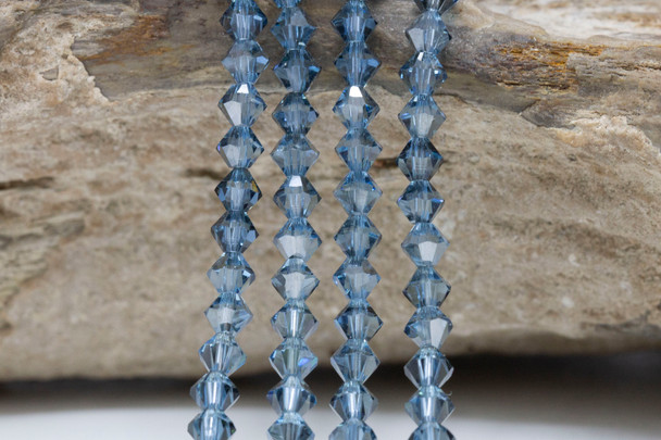Swarovski Crystal Aquamarine Satin 5328 4mm Bicones