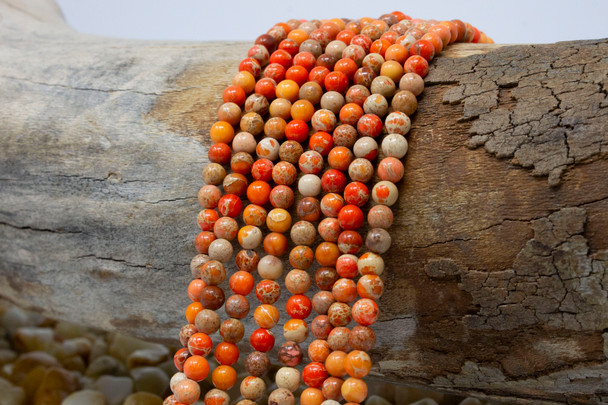 Impression Jasper Dyed Orange Polished 4mm Round