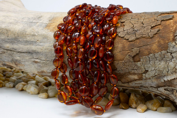 Baltic Amber Honey Cognac Polished 8-11mm Oval - 17" Strand