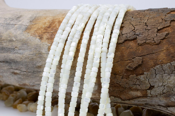 Natural Shell 3x4mm Polished Wheel - 7" Strand