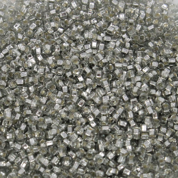 Size 15 Toho Seed Bead -- 21A Pale Grey / Silver Lined