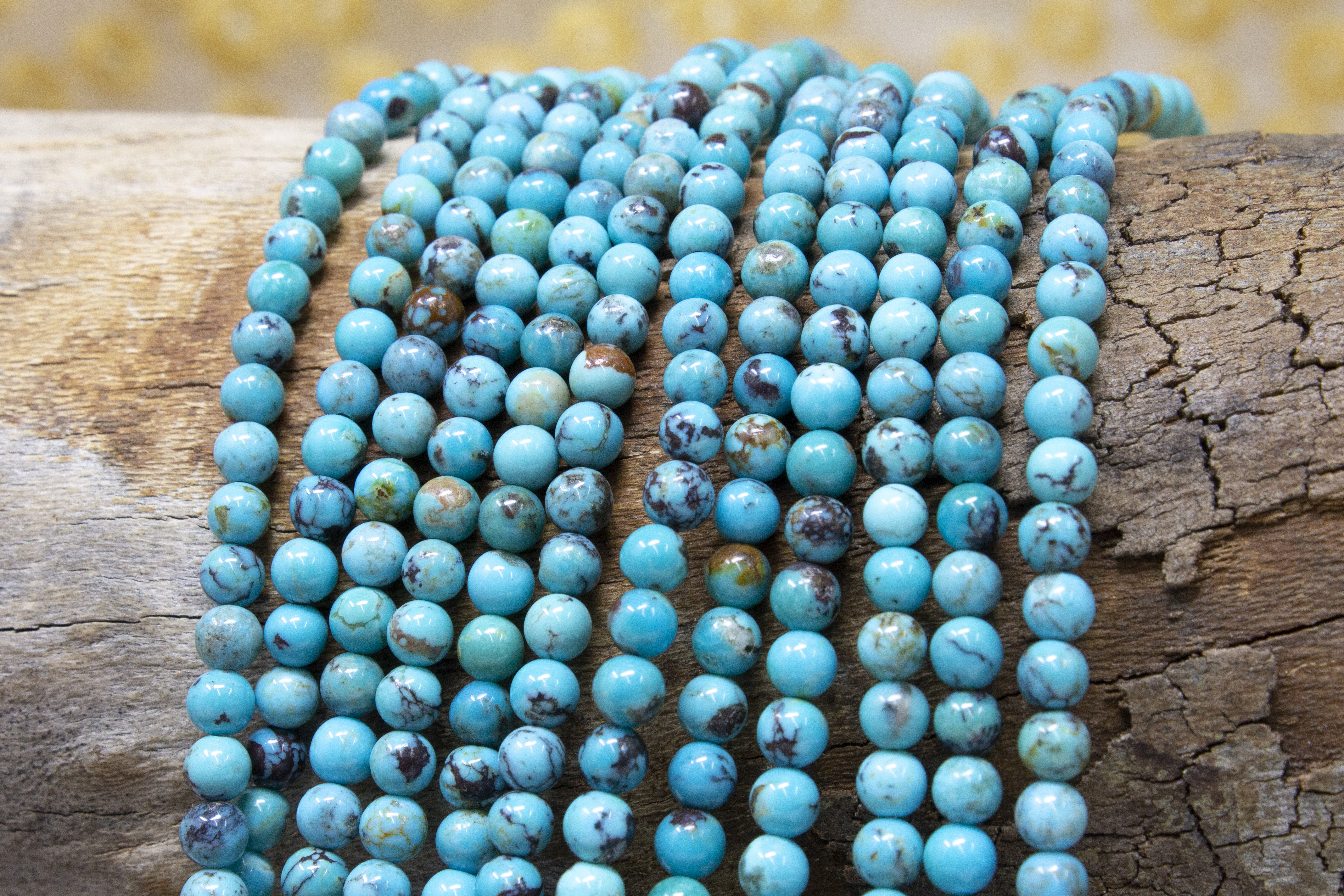 Hubei Turquoise Polished 4mm Round Bead World - Main Image