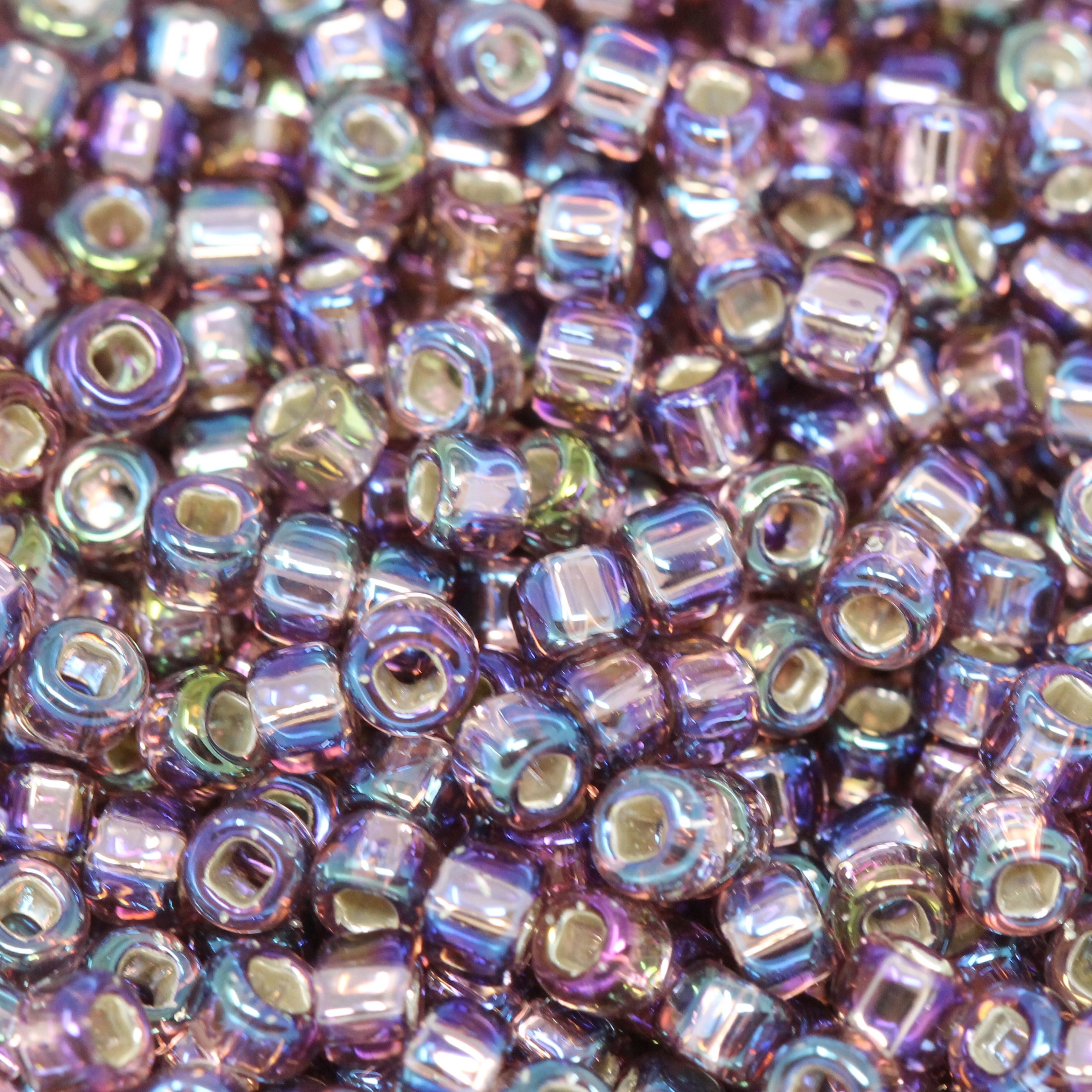 Size 8 Matsuno Round Seed Beads - Light Amethyst AB, Silver Lined