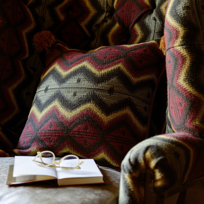 Mind the Gap Pillow Pyramidenspitze Cushion TYROL APRES-SKI HOME COLLECTION 35% Cotton, 28% Polyacrylic, 23% Wool, 14% other fibres Made in Romania Leather piped edge and tasseled corners 20 x 20 in - My Fabric Connection -