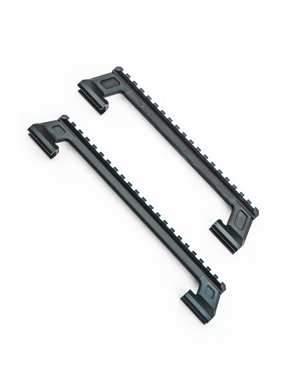 MODULAR RAIL RISER AND CARRY HANDLE