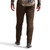 Model wearing Sitka Gradient Pant in Earth rear view