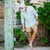 Model wearing a Poncho The Amberjack  in a brown and green plaid, Slim Fit