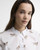 Model wearing a Barbour Women's Brambles Shirt with Multi-dog Print