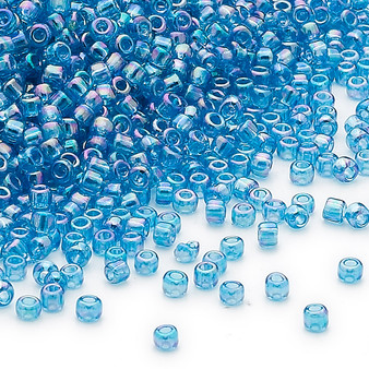 Seed bead, Dyna-Mites™, glass, transparent rainbow teal blue, #11 round. Sold per 40-gram pkg
