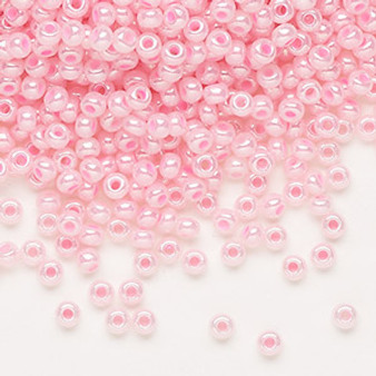 Seed bead, Preciosa Ornela, Czech glass, opaque pastel pink luster, #8 rocaille. Sold per 50-gram pkg.